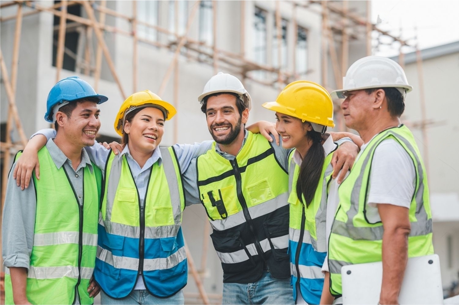 stock-photo-group-of-happy-construction-team-with-architect-engineer-laughing-together-at-building-site-2359490547-transformed